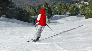 female skier coming down a slope